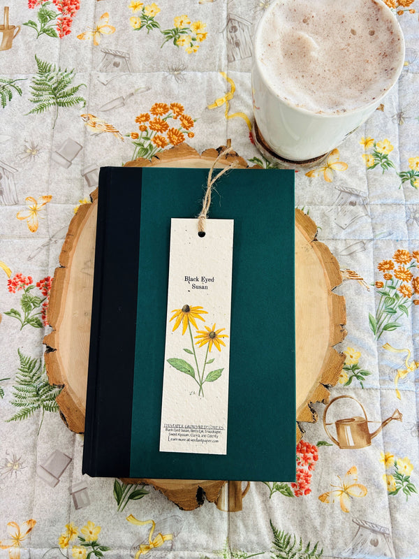 Hand drawn Black Eyed Susan flower on a plantable bookmark. Flowers and link for growing instructions printed on bottom of bookmark