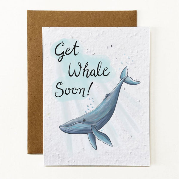 Get Whale Soon Get Well Soon Seed Paper Greeting Card. A hand drawn humpback whale with sun beans shining through the water. The greeting cards says "Get Whale Soon".
